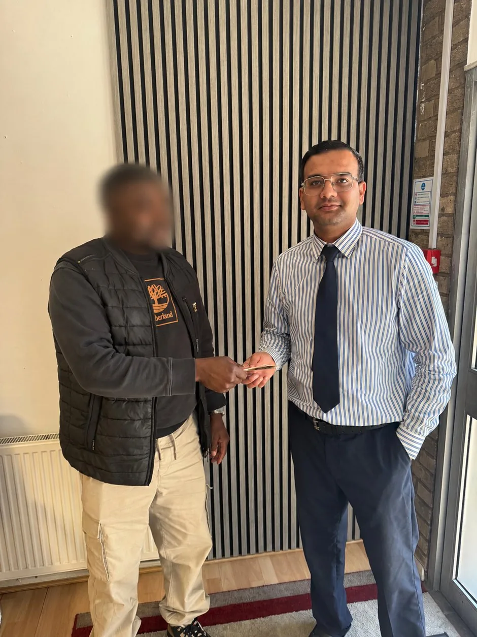 Client returning to KQ Solicitors Luton office to thank the immigration team